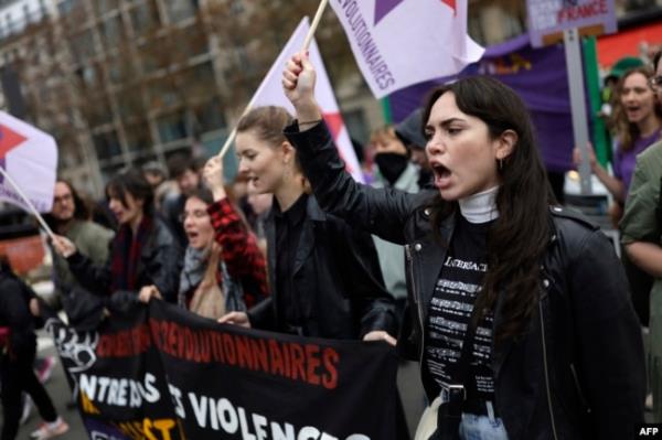 A protester shouts during a rally organized by women's rights groups to defend the right to abortion on Internatio<em></em>nal Safe Abortion Day in Paris, Sept. 28, 2024.