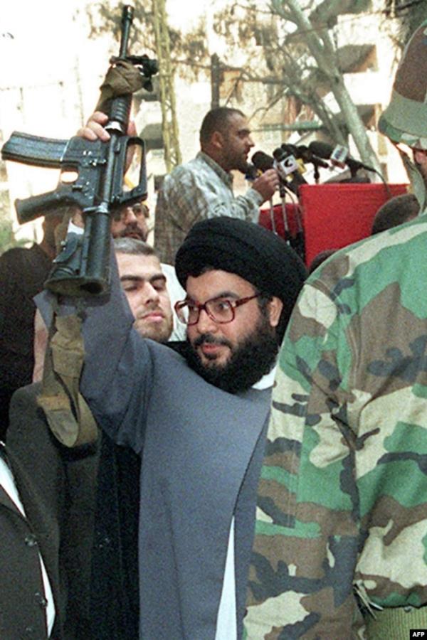 FILE - Lebanon's Hezbollah leader Sayyed Hassan Nasrallah addresses his supporters during a religious procession to mark Ashura in Beirut's suburbs on Nov. 14, 2013. Israel claimed on Sept. 28, 2024, that it killed Nasrallah in an airstrike on Hezbollah's headquarters.