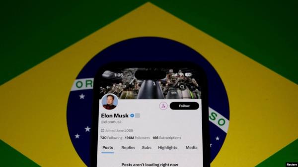 FILE - The X account of Elon Musk is seen blocked on a mobile screen in this undated illustration after Brazil's telecommunications regulator suspended the social platform. Brazil's Supreme Court said X needs to pay its fines before it will be allowed to resume service in Brazil.