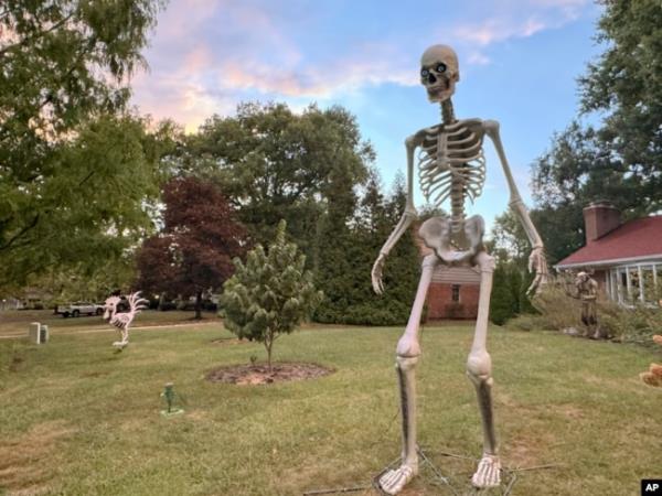 A 3.6-meter Home Depot skeleton presides over the front yard of a Cincinnati home on Sept. 24, 2024.