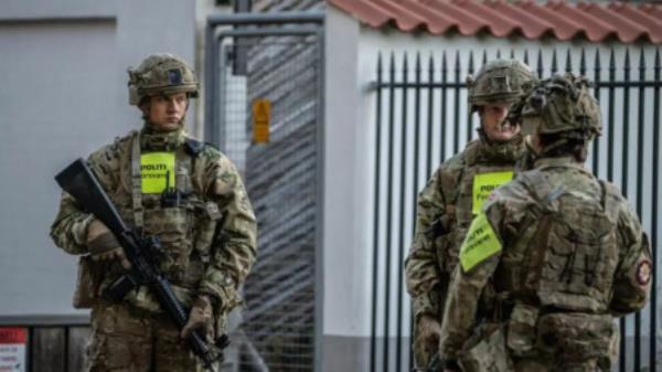 Danish military Police guard the Israeli embassy in Copenhagen after two blasts went off nearby. Photo: AFP