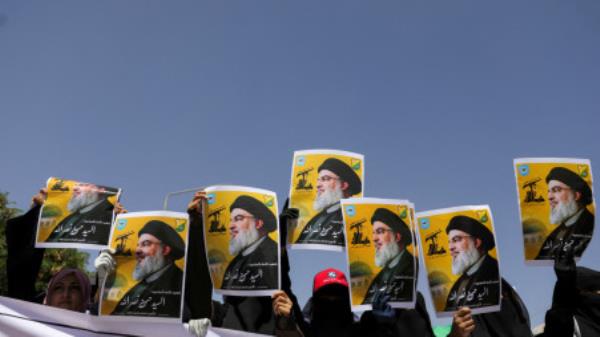 Students hold posters of Hassan Nasrallah, the assassinated chief of Lebanon&#039;s Hezbollah, during a rally in Sanaa, Yemen October 2, 2024. REUTERS/Khaled Abdullah

