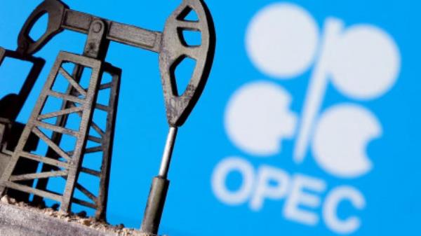 A 3D printed oil pump jack is seen in front of displayed OPEC logo in this illustration picture, April 14, 2020. Photo: REUTERS/Dado Ruvic/Illustration/File Photo