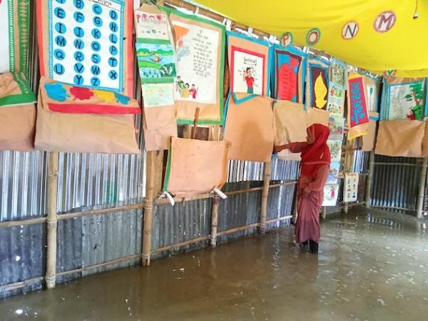 Posters hang on the wall inside a UNICEF-supported learning centre that has been forced to close due to flooding in Sunamganj, northeastern Bangladesh. Credit: UNICEF