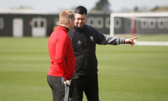 Robert Rowan (right) with then head coach, Dean Smith, in 2017